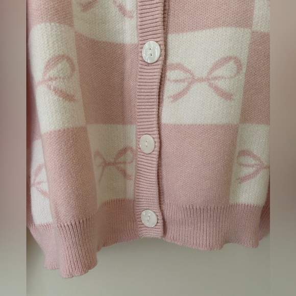 Sincerely Jules Baby Pink and White Knit Bow Cardigan
Size: Small
NWT - Picture 10 of 15